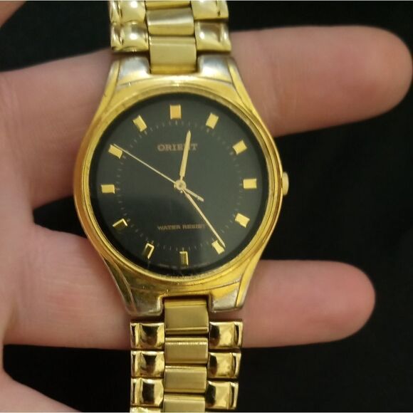 Golden Orient watch with a dark blue face - Picture 5 of 11